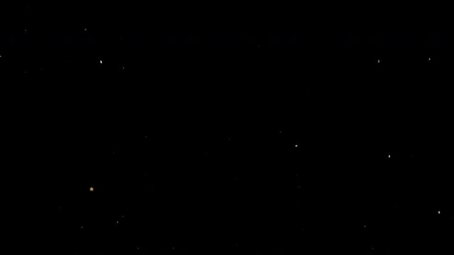 Super Slow Motion Shot of Flying Small Particles , Isolated on Black Background , Filmed on High Speed Cinematic Camera at 1000 FPS