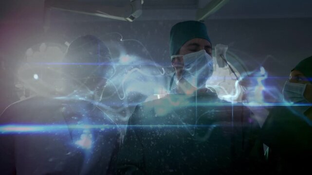 Assistant raising gauze to lead surgeon's brow, prepping surgeon while holo streaks crossing faces