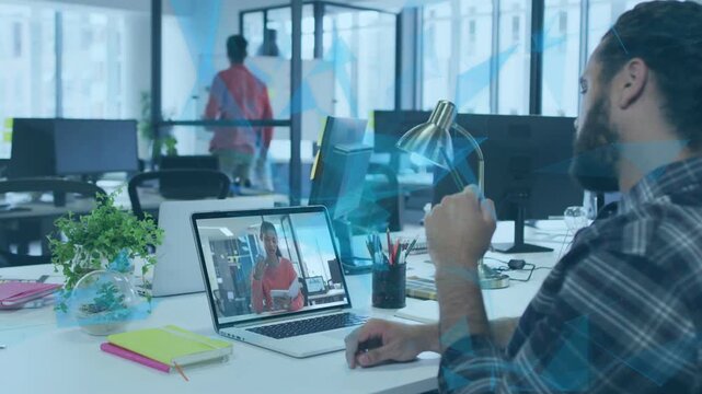 Vertical video: Remote host starting, man replying while touching lamp as peer walking past board