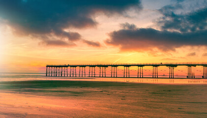 Fototapeta premium Sunset pier at Saltburn by the Sea, North Yorkshire, UK