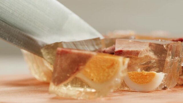 Meat aspic, slavic food, Traditional Russian pork meat aspic Kholodets with horseradish, mustard, jellied jelly beef, eating in restaurant chicken tasty dish. Close up on kitchen. 