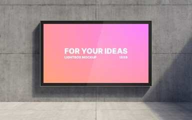 A 16x9 horizontal advertising screen is placed against a concrete wall. Presentation space. Advertising space. 3D rendering © Vladislav