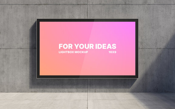 A 16x9 horizontal advertising screen is placed against a concrete wall. Presentation space. Advertising space. 3D rendering