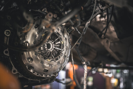 Close-up view of a car's internal clutch mechanism and wiring harness