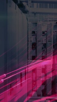 Vertical video: Faint streaks near wall causing pink beams sweeping server racks, showing data flow