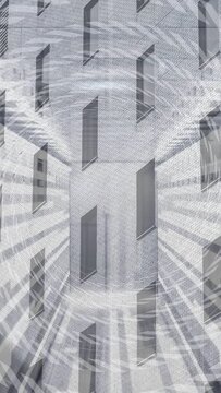 Vertical video: Brick wall staying static as vortex appearing, rays sweeping out pulsing for design