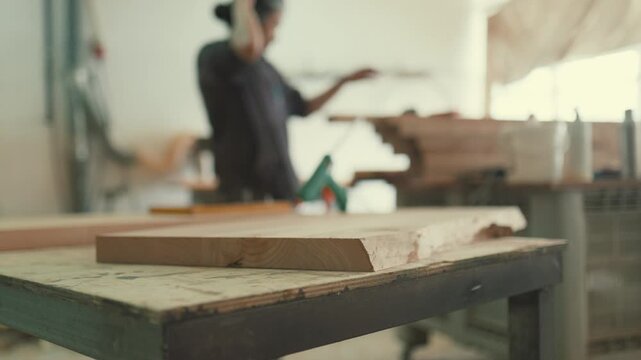 Woodworker preparing for carpentry work in workshop