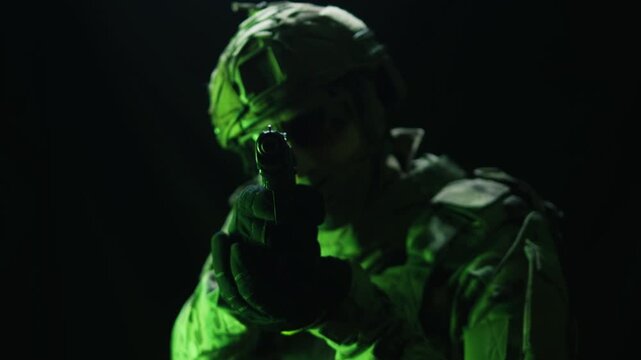 Portrait of modern soldier in military uniform and a helmet with headphones rifle, army warrior Warrior Military Gear Ready for Battle, airsoft Players in Tactical Gear and Riot Police Training