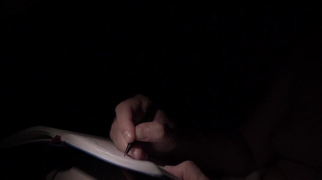 Man Journaling at Night for Self Help and Depression
