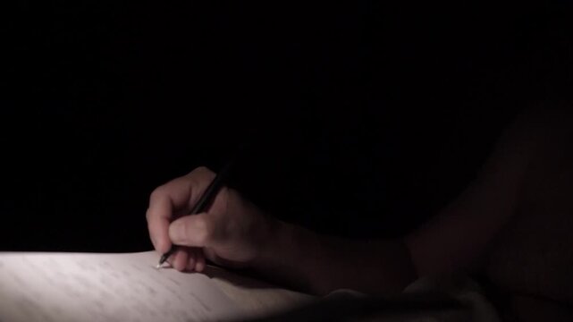 Man Journaling at Night for Self Help and Depression