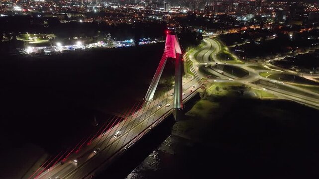 Toma a&eacute;rea nocturna del puente urbano Treng Treng de Padre las casas y luces de la ciudad de Temuco Araucan&iacute;a sur de Chile