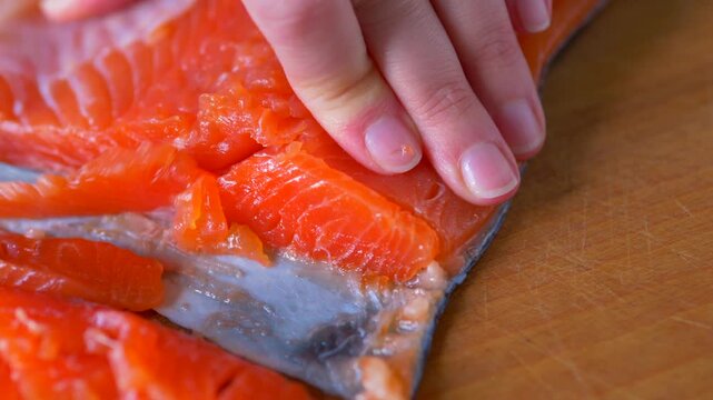 top-down view of smoked salmon being sliced into thin strips, Healthy Seafood Meal Prep Texture, Gourmet Fish Fillet Slices for Mediterranean Diet