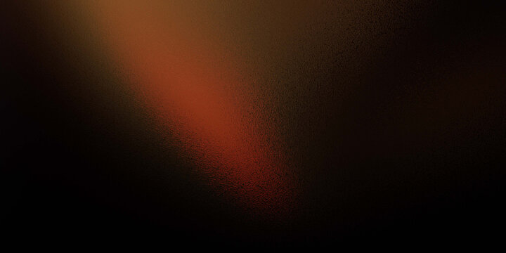 Warm light beam shining through darkness with vibrant orange and red hues slowly fading