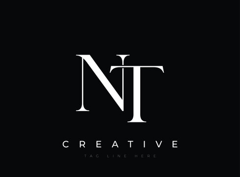 Nt creative logo design with white letters on solid color background