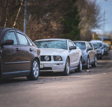 Gothenburg, Sweden - March 20 2026: 2005 Ford Mustang GT coupe parked along quiet residential street.