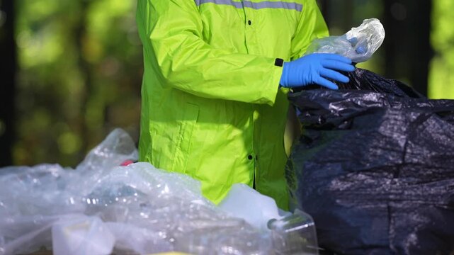 Garbage trash disposal helps restore ecosystems. Plastic trash collection makes a difference. Rubbish trash cleanup concept. Volunteers and trash waste recycling reduces pollution.