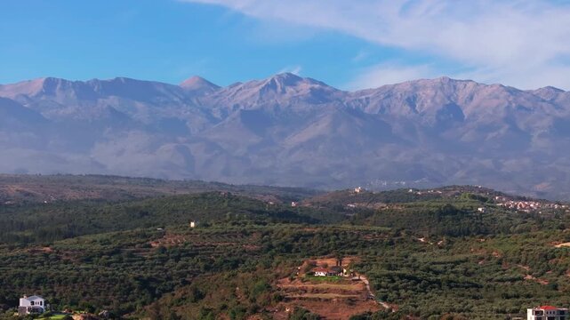 Aerial drone shot.View of famous beach in the summer, Crete, Greece. Famous beach with river and palm trees in Libyan sea. Tropical island, Panoramic view, Most beautiful beaches of Crete island