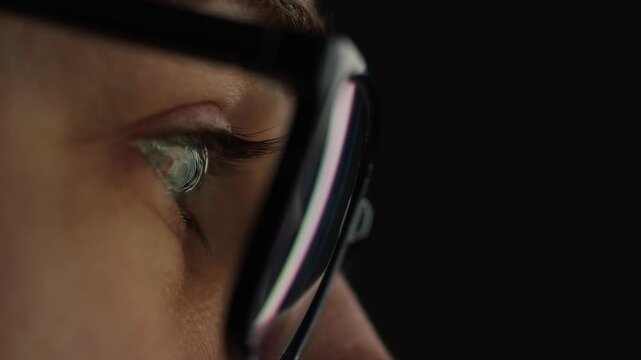 AI code on eyeglass glass, reflection on woman developer eyeglasses, working in dark office, tired busy people, depression on work, haker or it engineer with laptop, stocks markets. 