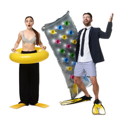 Office workers dreaming about vacation. Man and woman with inflatable ring, mattress and swim flippers on white background © New Africa