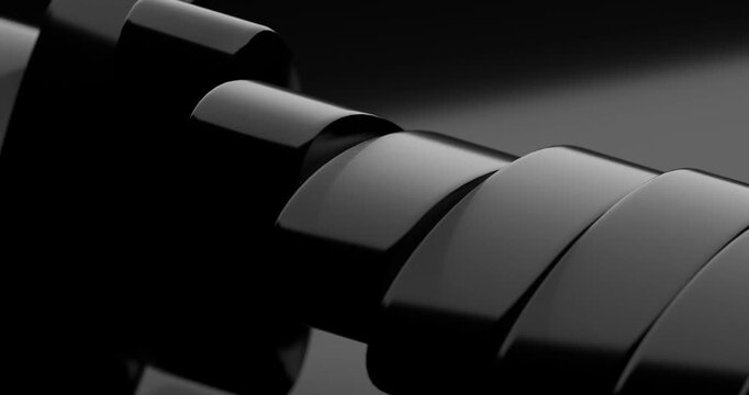 Abstract matte black layered curved panels close-up looping animation