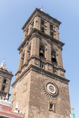 Obraz premium Puebla cathedral bell tower against clear blue sky