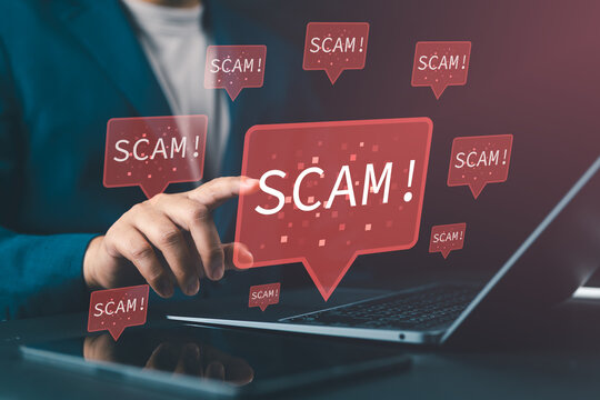 Online scam and internet fraud concept with scammer using laptop, representing malicious posts, fraudulent ads on social media, cybersecurity threats, and digital risk awareness.
