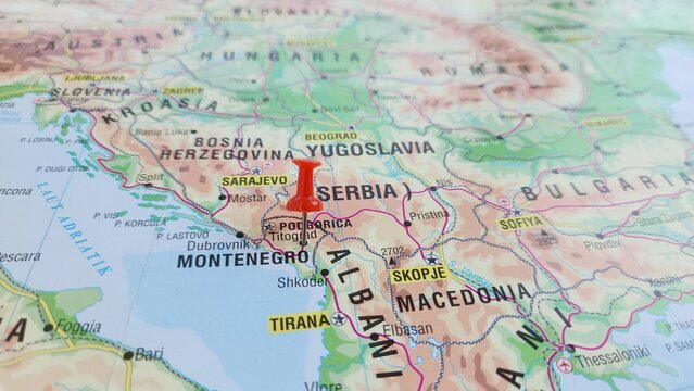View of Montenegro, is a country in Southeast Europe, on the Balkan Peninsula, on a geographical map of Europa, marked with red push pin