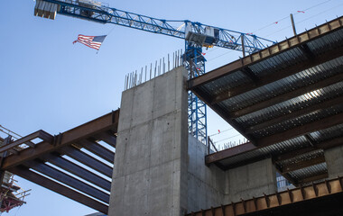 Fototapeta premium Construction Site with American Flag