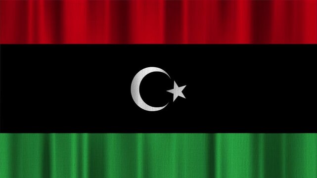 Libya flag waving in the wind with high quality fabric texture