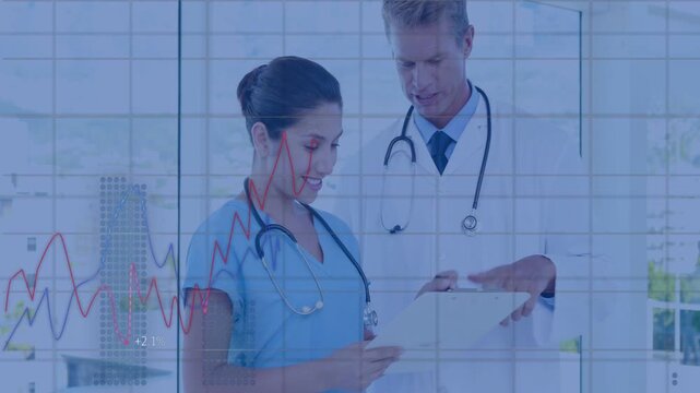 Reading clipboard aloud, medical professionals pointing, annotating and discussing patient metrics