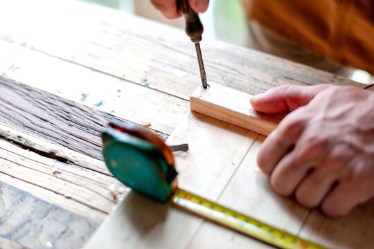 Carpenter working with precision tools
