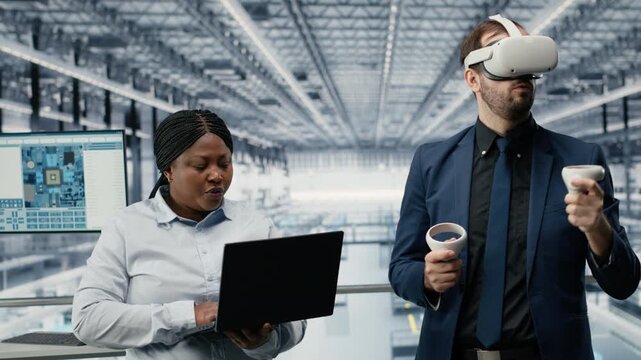 Portrait of engineering team monitoring PCB smart factory workflow using EDA software on display. Technicians use simulation application tracking microchip production circuit layout defects, camera B
