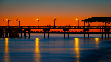 Obraz premium St. Simons Island Pier at Dusk with Warm Glow