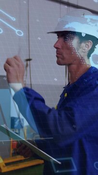 Vertical video: Tech reaching for rod and checking shackles in bay using AR grid for safety log