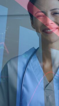 Vertical video: Nurse smiling as animated graphs sliding over stethoscope, conveying patient trust