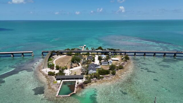 Aerial view circling the historic Pigeon Key and the old seven mile bridge in Marathon, Florida.