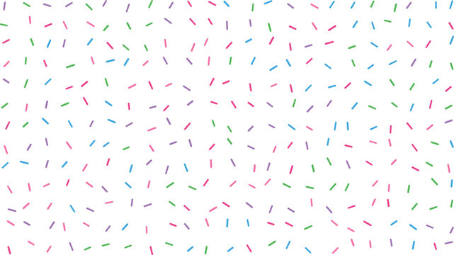 A cheerful arrangement of tiny multicolored sprinkle like shapes spread over a pristine white surface