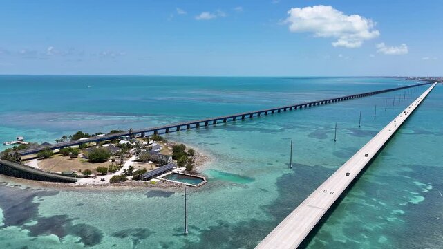 Aerial view of historic Pigeon Key and old seven mile bridge from over the newly constructed seven mile bridge in Monroe County, Florida.
