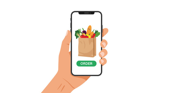 Person holding a smartphone displaying an online grocery shopping app with a bag full of fresh vegetables and a green order button at bottom.