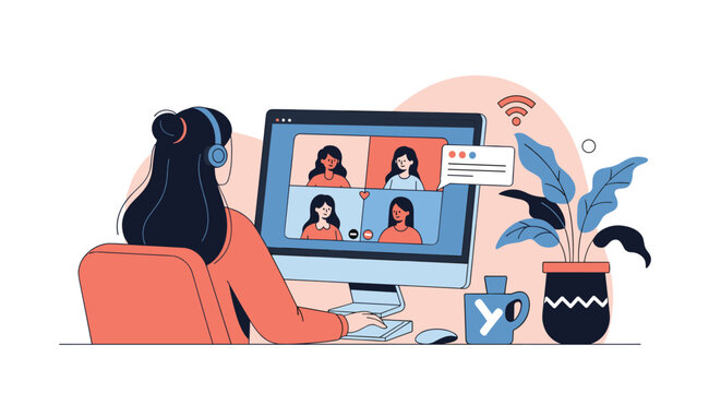 Woman participates in a video conference call with colleagues on her computer while working from home in a cozy environment with a plant.