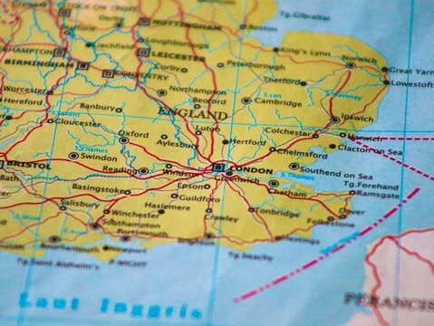 Close-up of a map of England focusing on London and major cities. Detailed cartography of United Kingdom's urban areas for travel planning and tourism concept.
