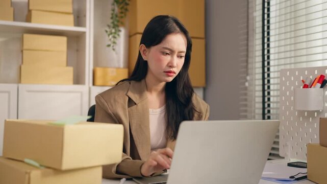 Frustrated young businesswoman organizing tasks in small home office. 