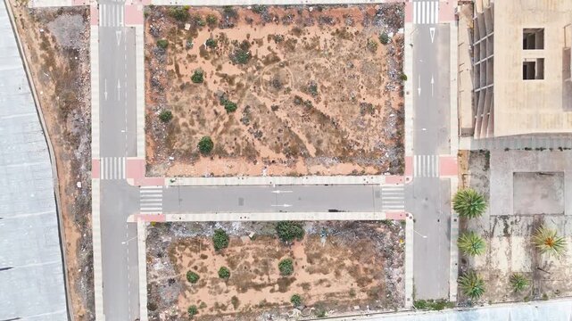 plot urbanism abandoned free project construction empty street drone frame clear - Andalusia, Spain - 2025