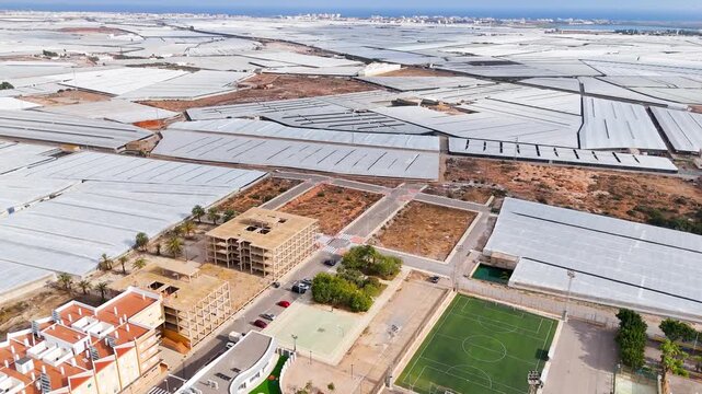 greenhouse industry drone agriculture field modern intensive farming urban invernaderos business travel success plot development - Andalusia, Spain - 2025