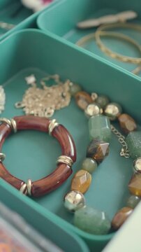 Jewelry showcase with various designs and colors