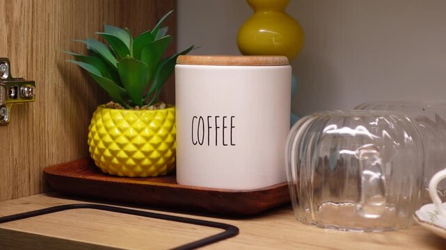 Coffee setup with glass cups and plants on kitchen counter