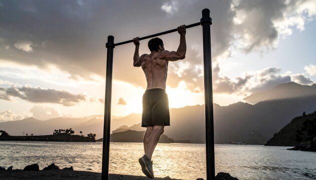 Man exercising outdoors on a pull-up bar.