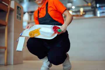 Clumsy Employee Drops Customer's Order Tray on the Floor. Restaurant worker spilling everything on...