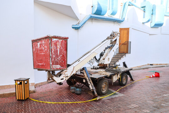 A manipulator lift with a cabin for working at heights.