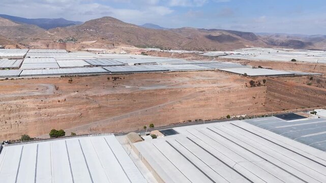 mine earth mining industry greenhouse plastic sea mountain texture food intensive farming drone dig - Andalusia, Spain - 2025